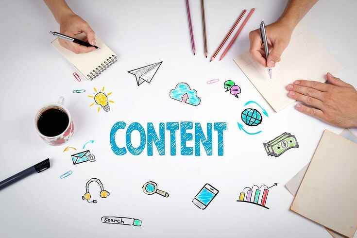 Content Marketing Tips: A Complete Guide to Grow Your Business Online. An overhead view of two people working at a white table centered around the hand-drawn blue word "CONTENT." The table is covered in colorful doodles of a lightbulb, a cloud, an envelope, and a globe. Each person is holding a pen and writing in a notebook, with a cup of black coffee and colored pencils also visible.